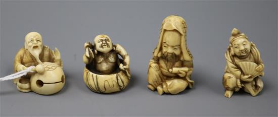 Two Japanese ivory netsuke of old men and two ivory okimono of immortals, late 19th/early 20th century